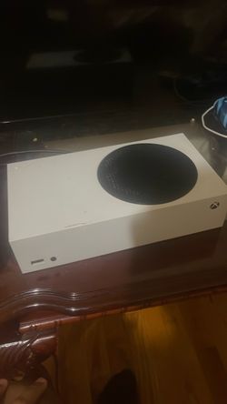 Microsoft Xbox Series S Console and Xbox storage card and two controllers