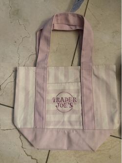 Trader Joe’s Embroidered Canvas Pink Stripe Mini Tote. Condition is New with tags