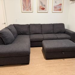 Living Spaces Lucy Dark Gray Sectional w/ Storage Ottoman 