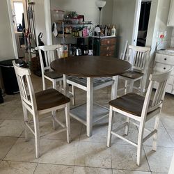 Wayfair four seated dining table and four stools
