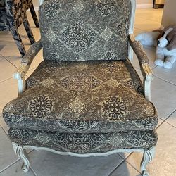 2 Provincial Arm Chair. Black and gold print . Dimensions - 29 “ w  back 35” h seat 24” deep