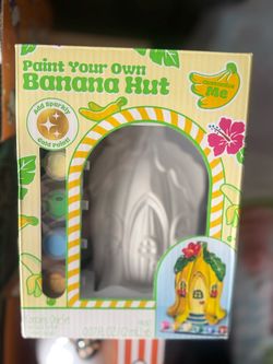 This Paint Your Own Banana Hut set includes a customizable, banana-shaped foodie house for painting.