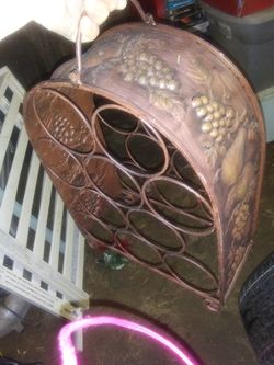 Bronze/ copper colored wine rack