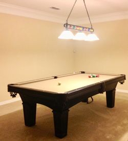 Olhausen’s 8’. Belmont Solid Wood Pool Table with lights, balls, and pool sticks