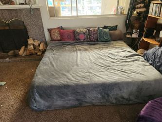 King sized mattress with boho pillows. FREE