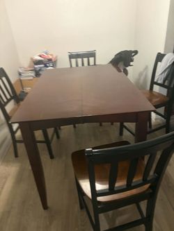 Brown big  table comes with chairs 4 of them