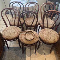 Set of six vintage bentwood café/bistro chairs with classic rounded hoop backs and curved legs.