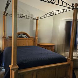 Queen canopy bed frame with two large nightstands