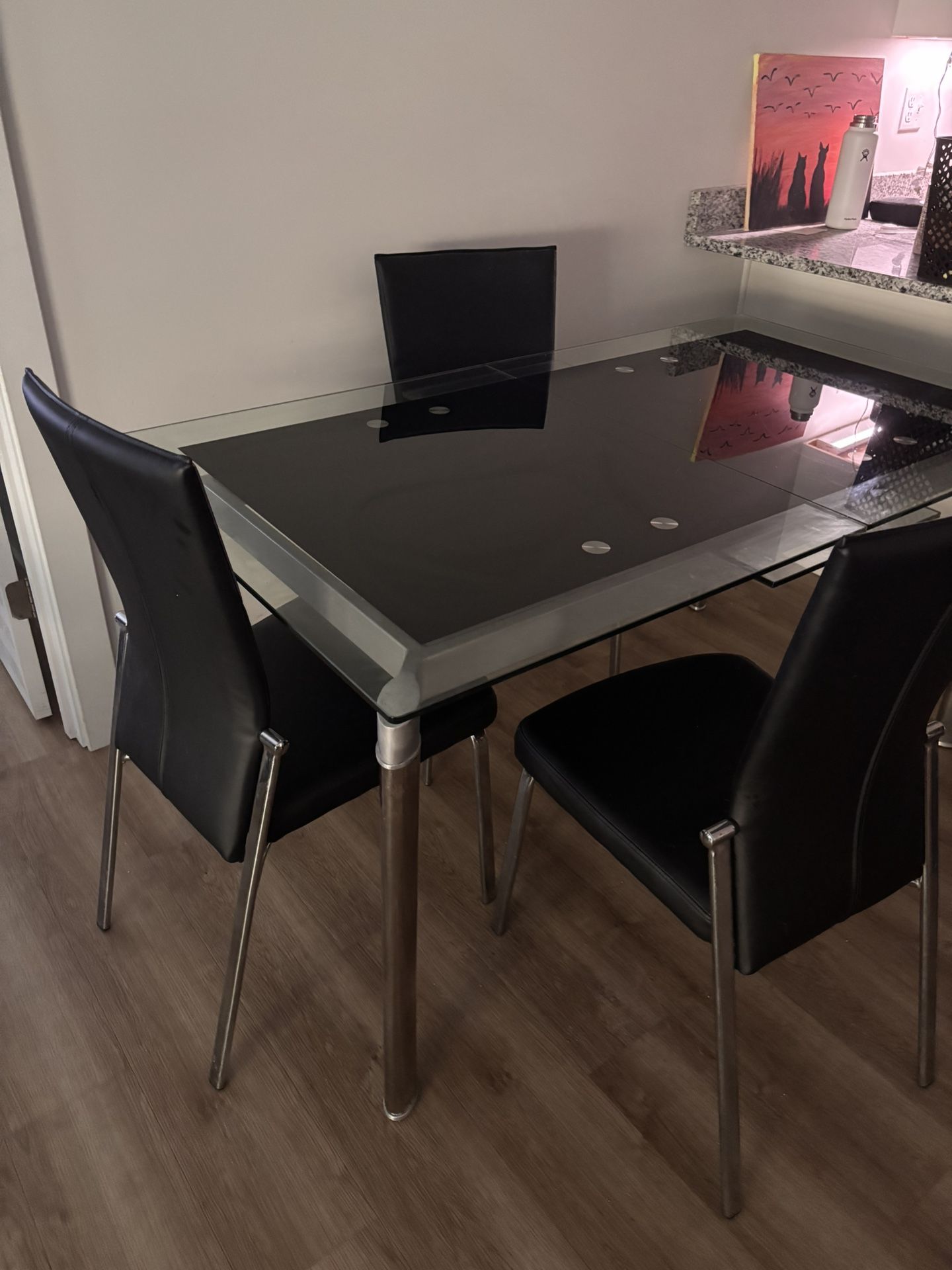 π¨ Must Sell by Tuesday β Expandable Glass Dining Table + 6 Reclinable Chairs