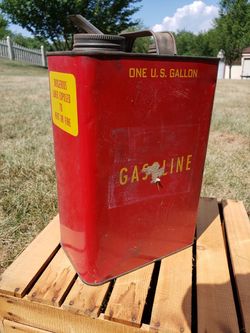 Vintage Red Gasoline Can with yellow lettering