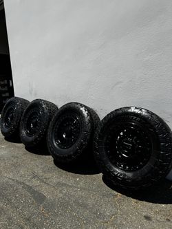 KMC KM552 IMS 8x180 18” Black Wheels With 35” Toyo Open Country AT3 All-Terrain Tires