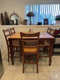 Tall Dining Table + 6 matching chairs and Butterfly leaf