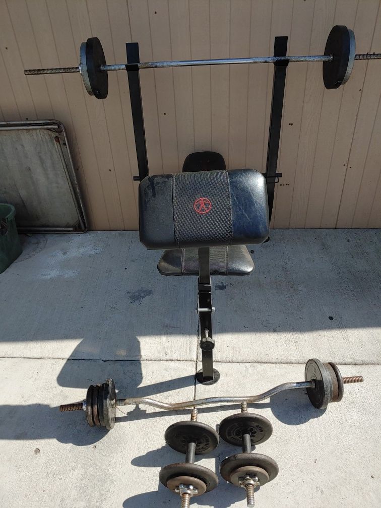Exercise Bench with bars and weights