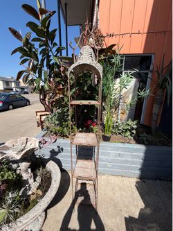 Antique solid metal wicker stealth unit perfect for outdoor Plants