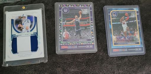 Patch card + low serialized football and basketball. Description