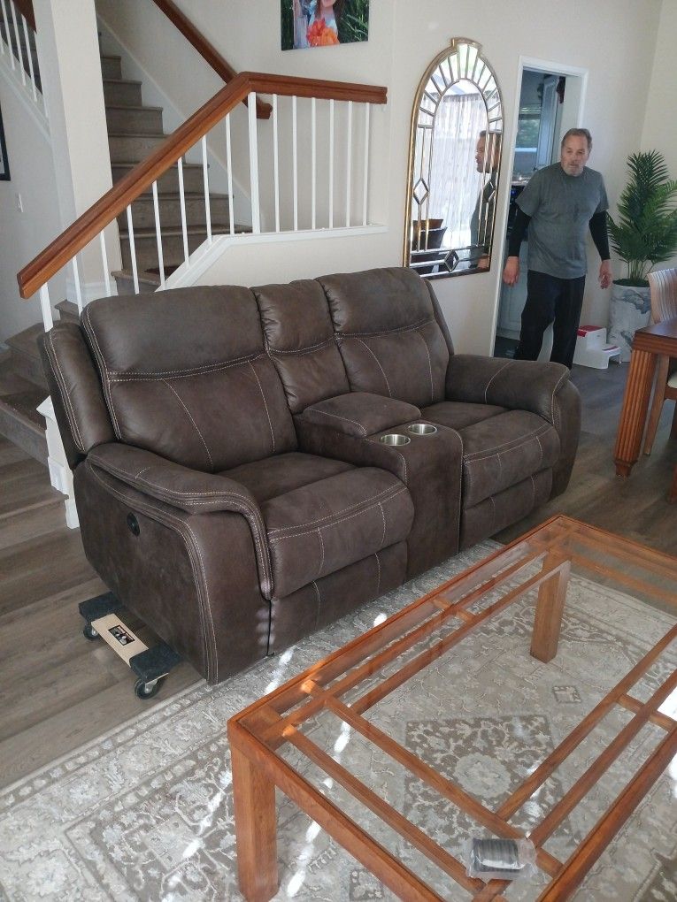 Electric recliner sofa with. With Is built in Electrical outlet good for charging cell phones