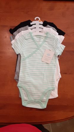 8 onesies Brand new with tags size 12m