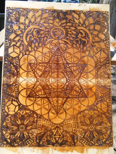 Laser engraved sacred geometry art work
