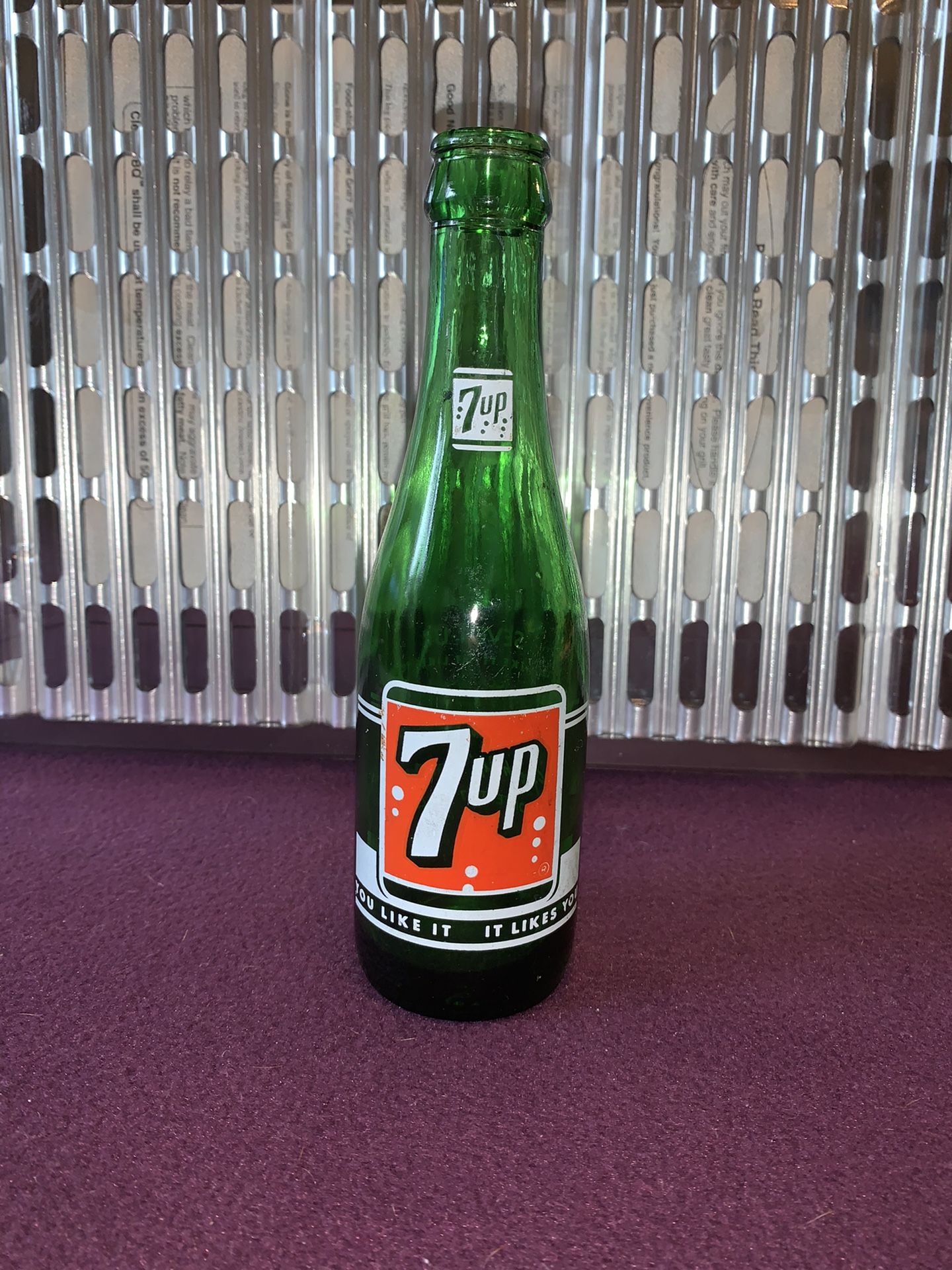 Vintage 1960s green Glass 7-Up bottle