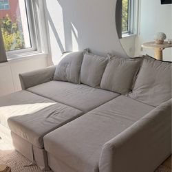 Beige sectional pull out couch