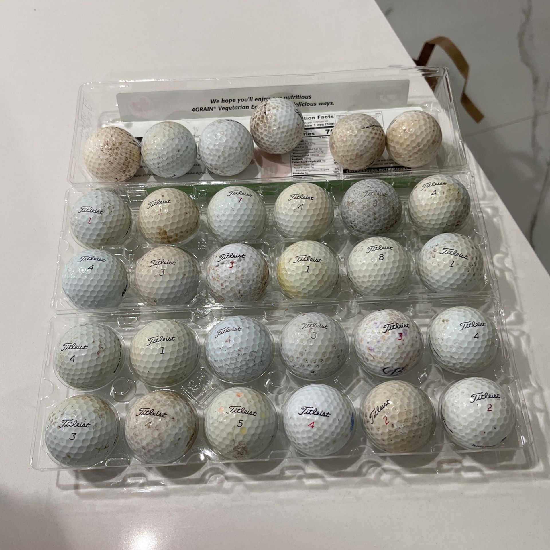 30 used titleist golf balls