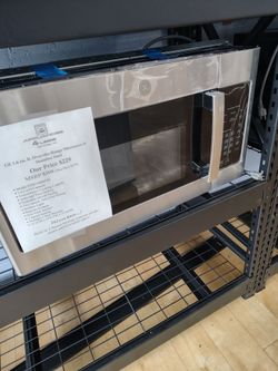 $229 GE 1.6 Cu ft over the range microwave  with nonstick interior