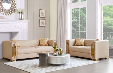 2 pc Stylish Cream Faux leather Glam Sofa & Love seat with gold details!!