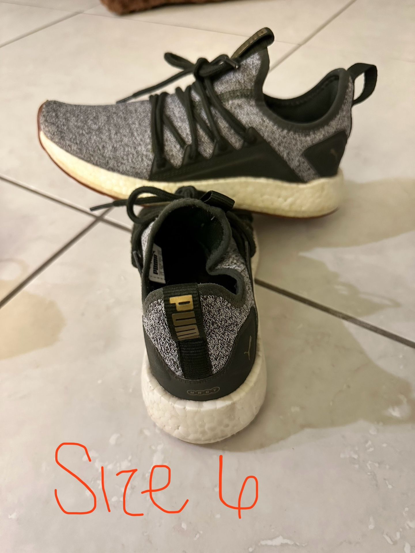 Puma Army Green Size 6 Women’s. Used