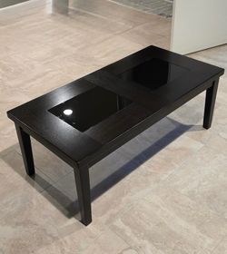 Wooden and glass cocktail table