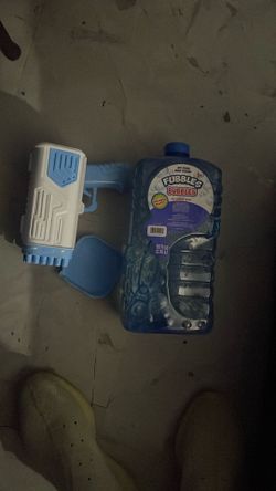 Bubble Gun 32 Hole Bubble Machine for Kids and Parties in Blue brand new with unopened bubble solution 20$ obo