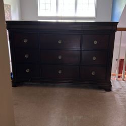 Brown Dresser With 9 drawers 