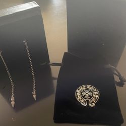 Iconic Chrome Hearts cross dangle earrings. Earrings are gold color with a detailed cross design. Comes with original Chrome Hearts box.