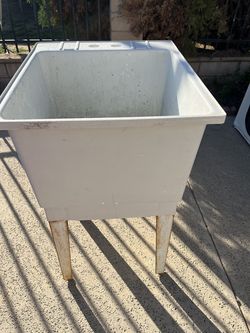 Used basic Utility sink standard garage size ,