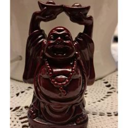 Vintage Red Resin Buddha Holding Ingots Above Head 4"
