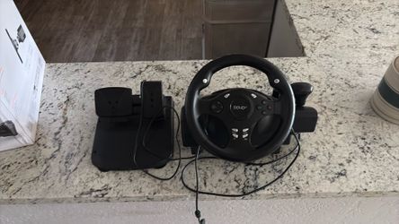 Steering wheel and pedals for X Box and Nintendo