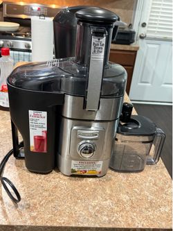 Cuisinart 5-Speed Juice Extractor (Model: CJE-1000). It is a high-powered, centrifugal juicer designed to handle both hard and soft fruits and vegetab