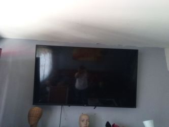 65' inch  Flat Screenb TCL TV Wall Mounted