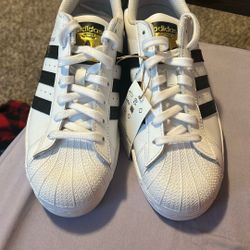 White Adidas Superstars