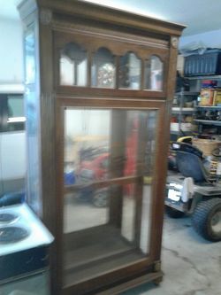 Wood and glass China cabinet