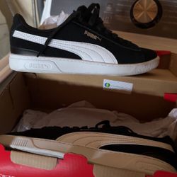 Boys black and white Pumas  Size 7