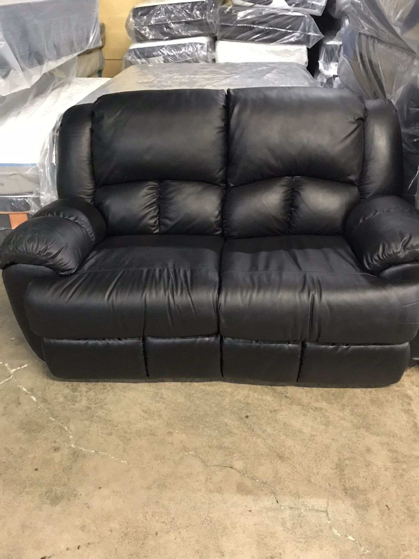 Brand New Loveseat With Recliner$299.