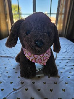Hug Me brand brown stuffed puppy
