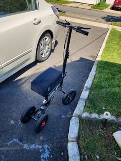 Scooter with brakes and shock absorber