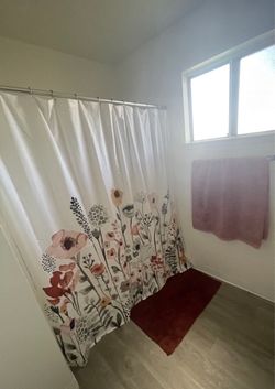 Fabric shower curtain with hooks $20