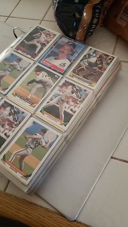 Baseball football and basketball cards