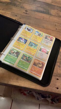 Pokémon Trading Cards in Binder yellow trim