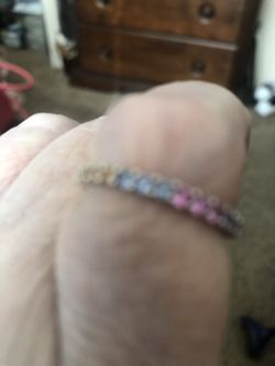 Eternity ring w/multiple color sapphire size 8