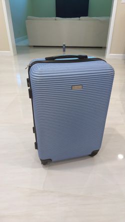 Checked in luggage suitcase, roller