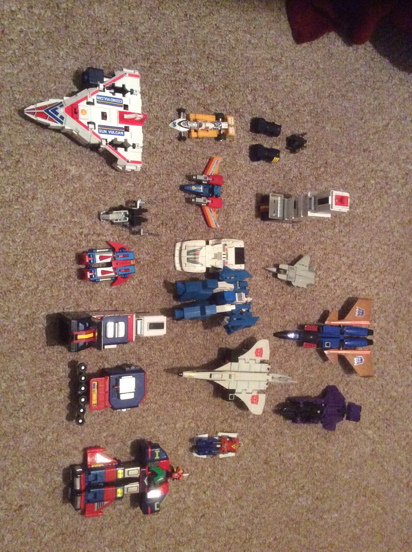 Various Transformers Toys, Figures, and Parts