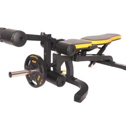 Powertec weight bench with the leg extension attachment 